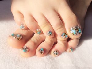 フットのターコイズとゴールドのストーンびっしり