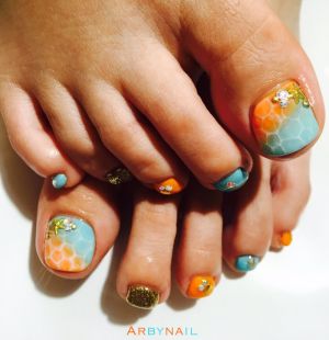オレンジ×ターコイズブルー水面ネイル