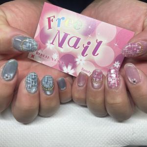 アシンメトリーカラーの上品ツイードネイル